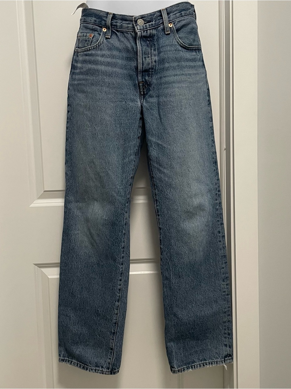 Classic Levi's Women’s 501 '90s straight jeans in a medium wash blue, W24 L30